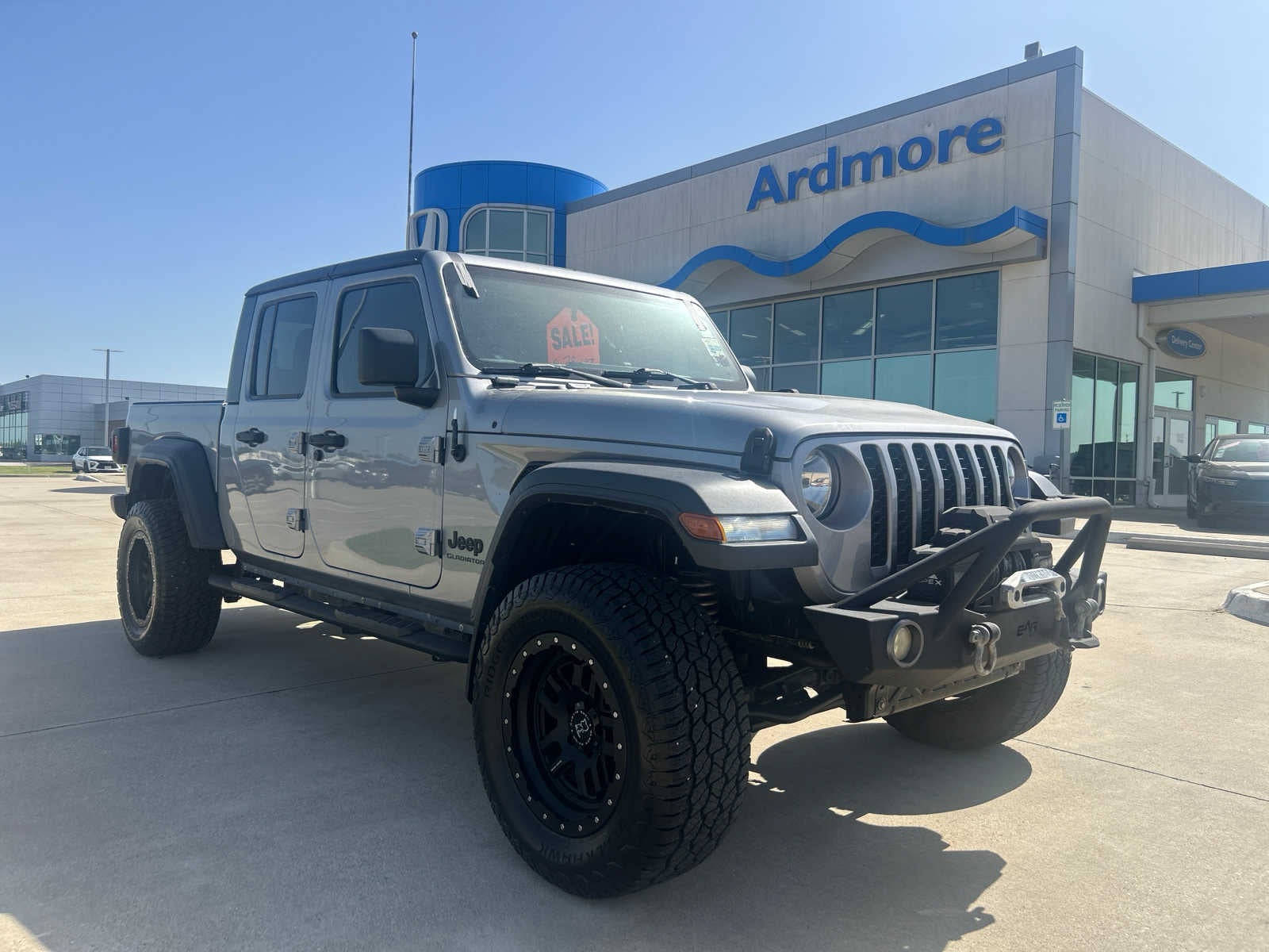 2020 Jeep Gladiator Sport S in Billet Silver Metallic Clearcoat — front three-quarter view